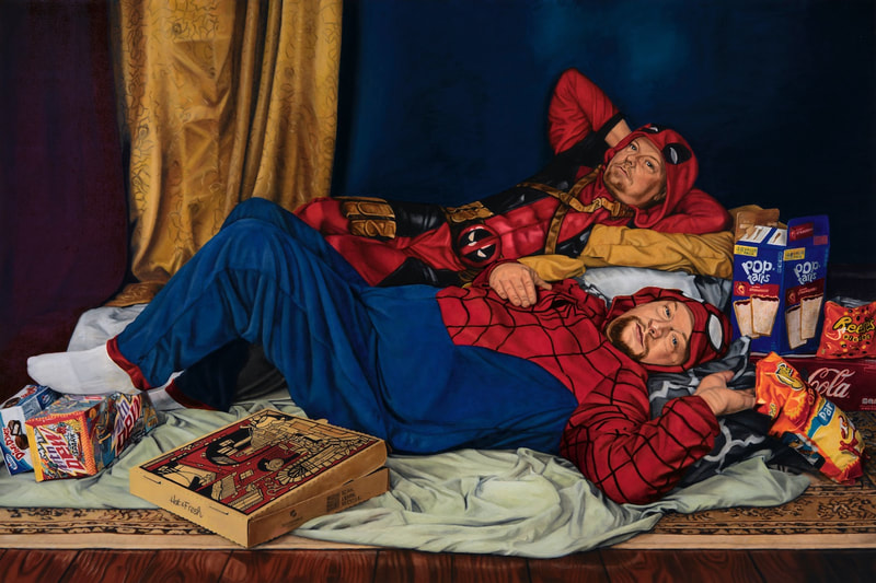 Two Brodalisques portrays a pair of men luxuriating on cushions in a draped room amongst a stockpile of junk food. They are dressed in superhero onesie pajamas while splayed upon cushions as they gaze at the viewer.
